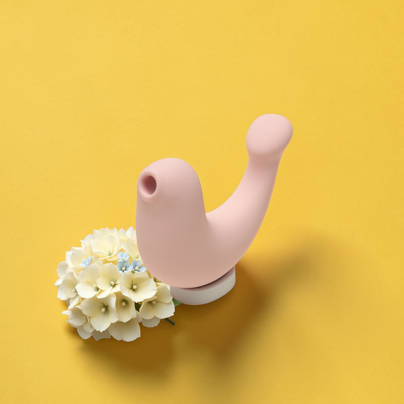 Osuga G-Spa vibrator with white flowers on a bright yellow background, LemmeSensa